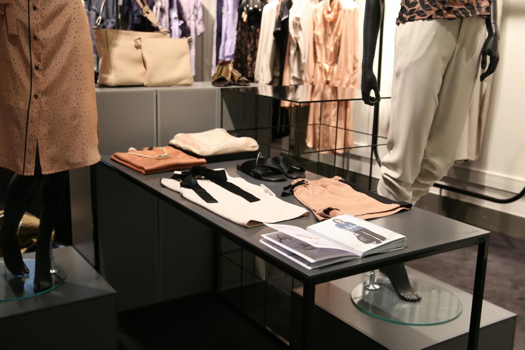 pexels-photo-1488467-1488467 A modern boutique display showcasing stylish, health-conscious clothing on mannequins, illustrating the connection between thoughtful apparel choices and personal wellness.