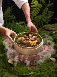 A vibrant gourmet dish of mushrooms and vegetables steamed to perfection, showing how cooking destroys nutrients less when using gentle steaming techniques.