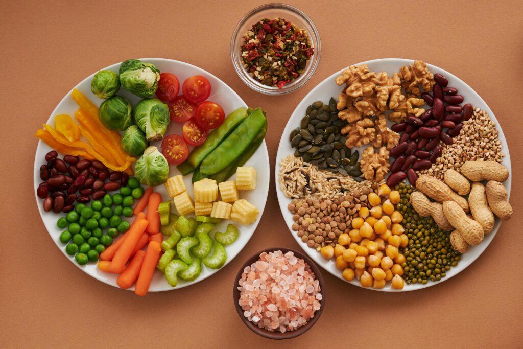 A hearty portion of iron-rich foods for an anemia diet, featuring leafy greens, legumes, nuts, and whole grains for blood production. A hearty portion of iron-rich vegetables, legumes, and seeds, the foundation of a powerful diet for anemia to support blood production.